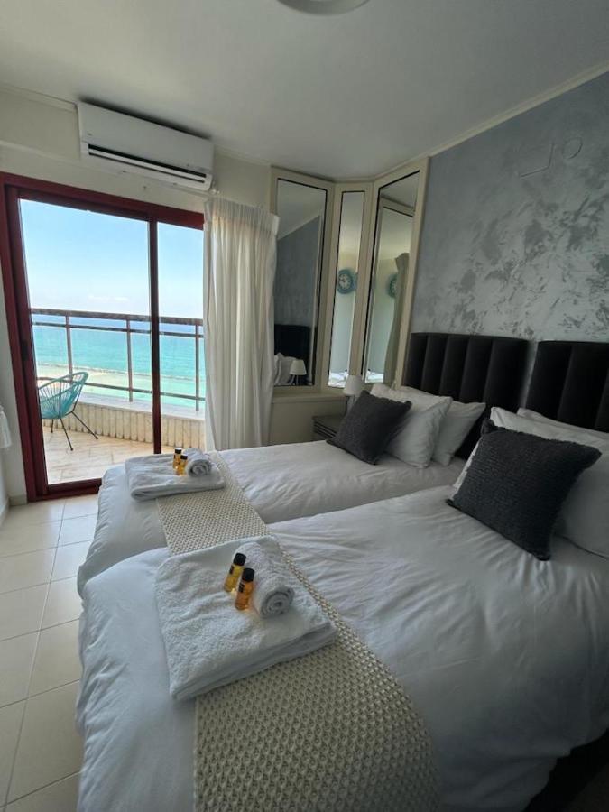 Sea-Front Apartment Netanya Bagian luar foto